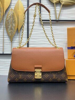 Louis Vuitton Madeleine Handbag
